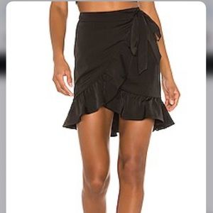 Lovers + Friends Vienna Skirt in Black Ruffle Tulip Wrap w/ Bow Tie from Revolve